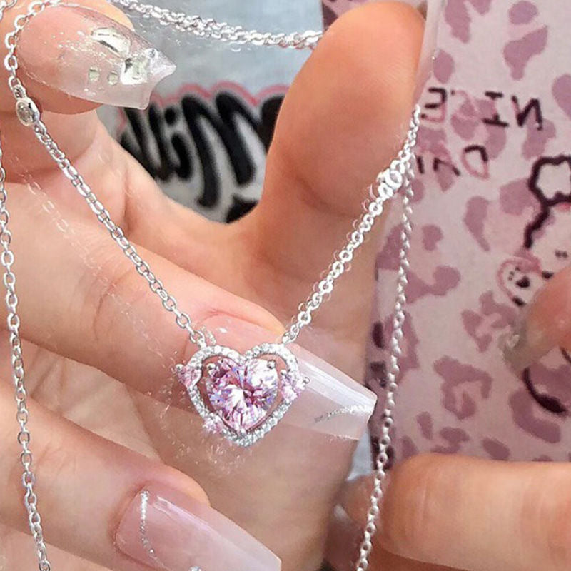 Damen Halskette mit herzförmigem, funkelndem Kristall und eleganter Silberkette Shop Nory