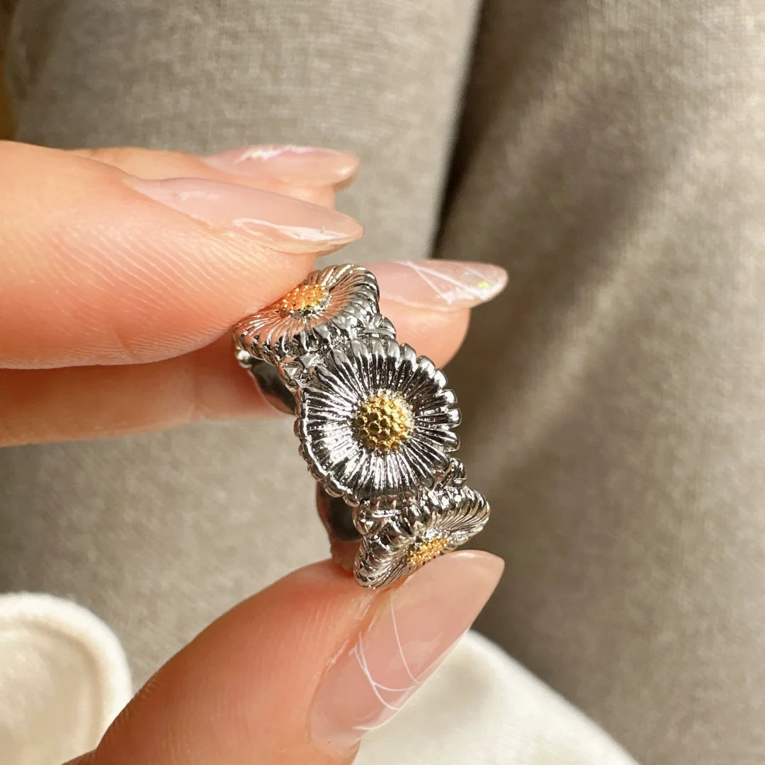 Damenring mit floralen Motiven und kunstvoller Metallbearbeitung Shop Nory