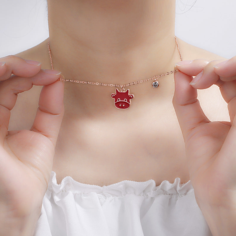 Damen Halskette mit verspieltem Kuhanhänger und funkelndem Zirkonia Shop Nory