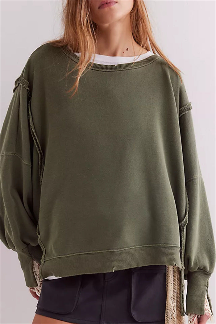 Damen oversized Sweatshirt mit Ballonärmeln, offenen Saumnähten und seitlichen Schlitzen Shop Nory