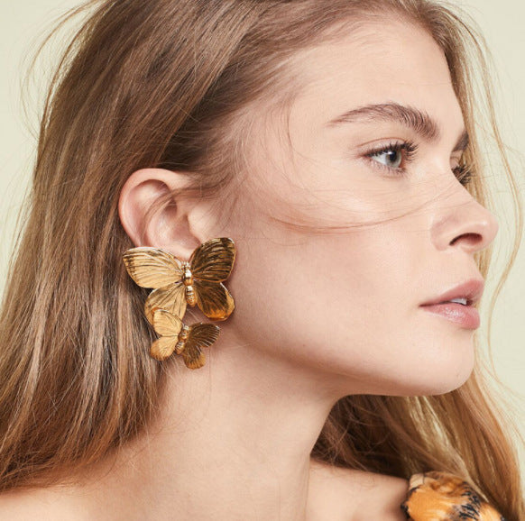 Damen Ohrringe mit kunstvollem Schmetterlingsdesign Shop Nory
