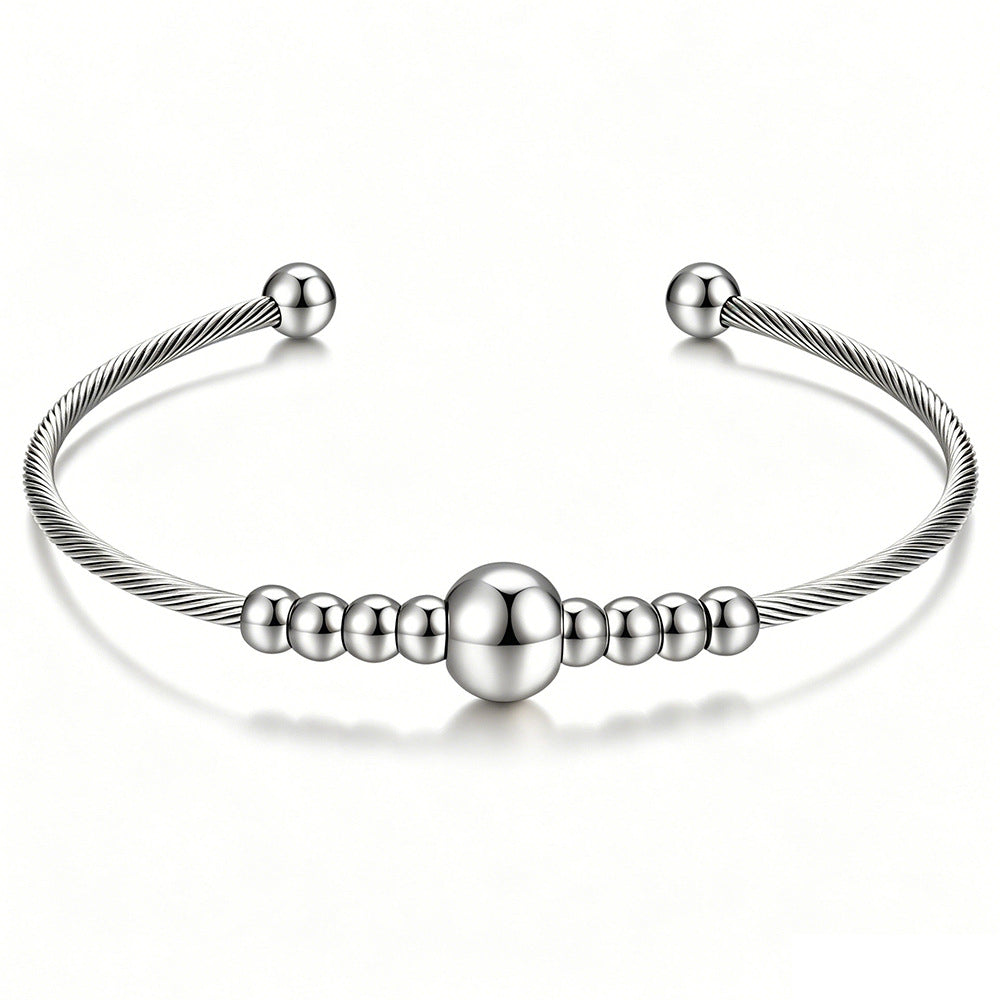 Damen Armreif mit elegantem Drahtdesign und funkelnden Kugeldetails Shop Nory