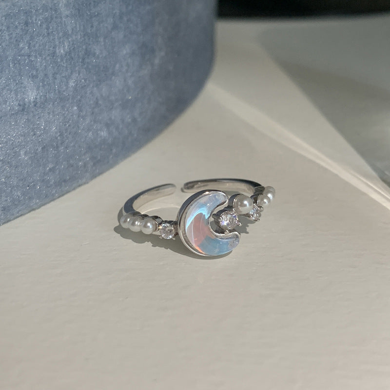 Damenring mit funkelndem Sternendesign und eleganten Perlenakzenten Shop Nory