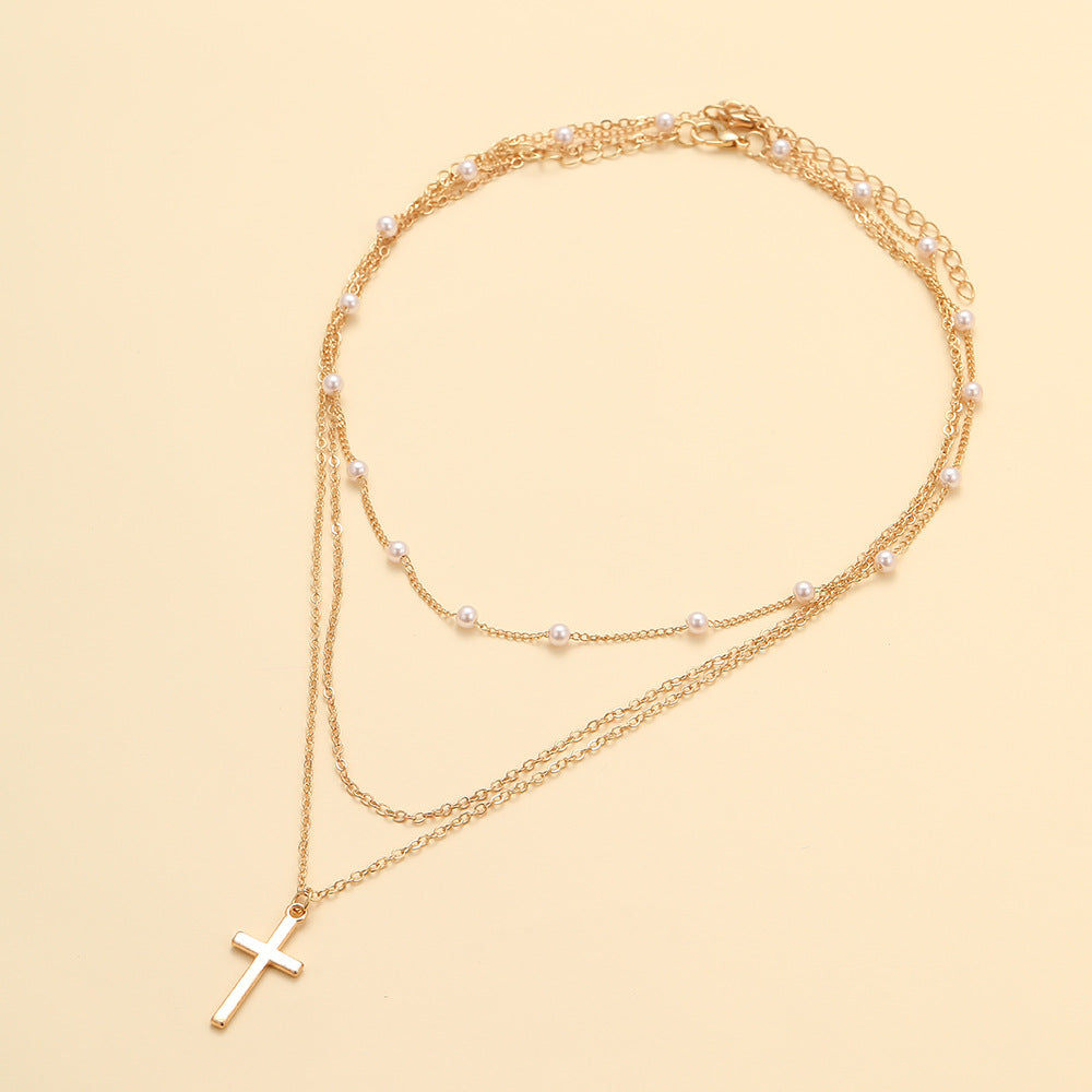 Damen Halskette mit mehrlagigem Perlen- und Kreuzdesign Shop Nory