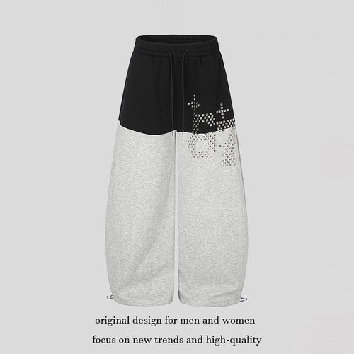 Damen Oversize Two‑Tone Palazzo‑Sweathose aus French Terry mit Logo‑Nieten, Tunnelzug und verstellbarem Saum Shop Nory