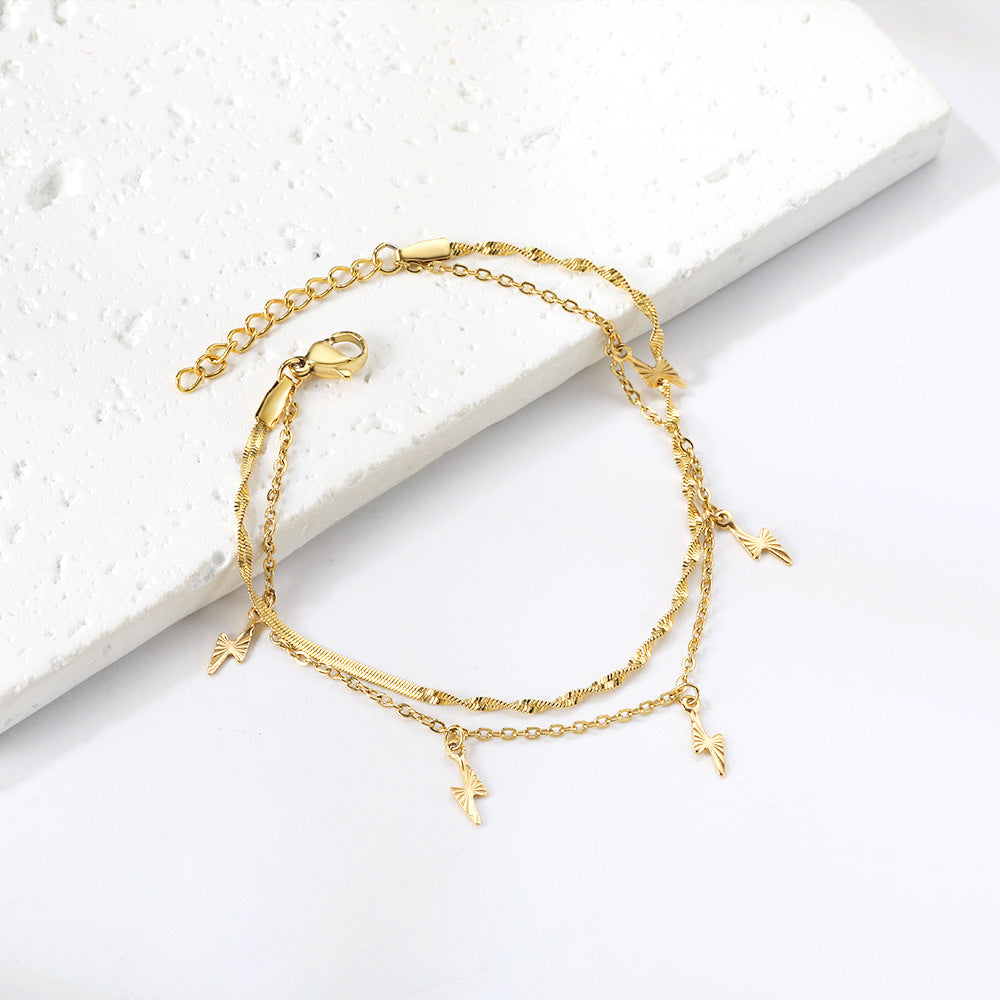 Damen zartes Armband mit erstellt Charm-Anhängern aus Edelstahl und goldplattierter Oberfläche Shop Nory