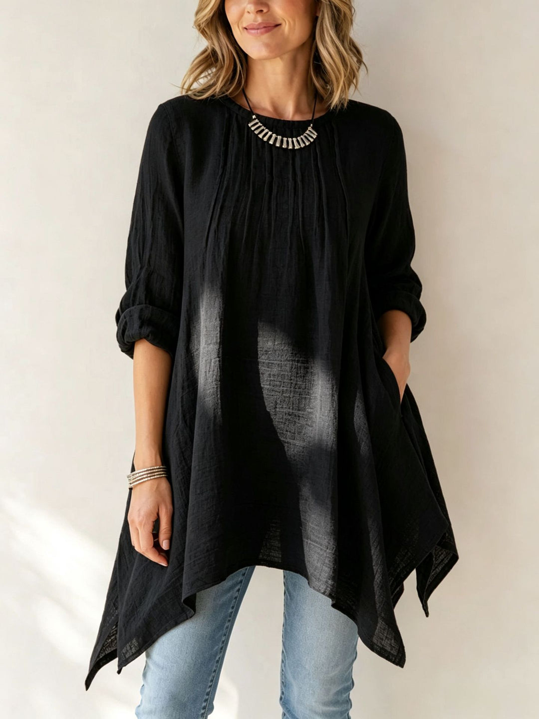 Damen Lässige Tunika-Bluse mit asymmetrischem Saum, feiner Waffelstruktur und Kellerfalten Shop Nory