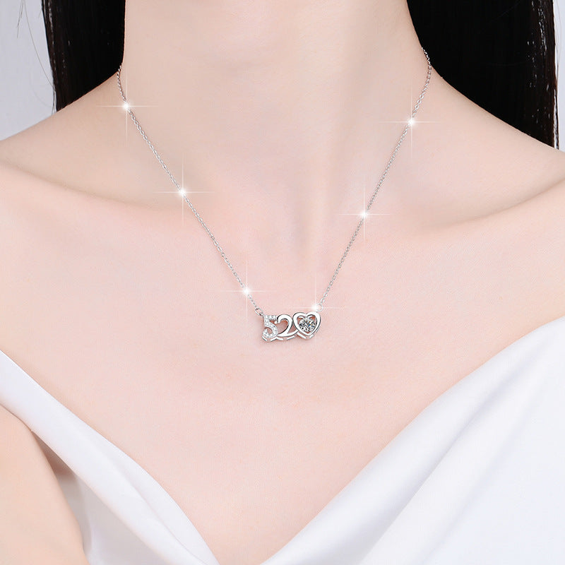 Damen Halskette mit herzförmigem Anhänger und funkelnden Kristallen Shop Nory