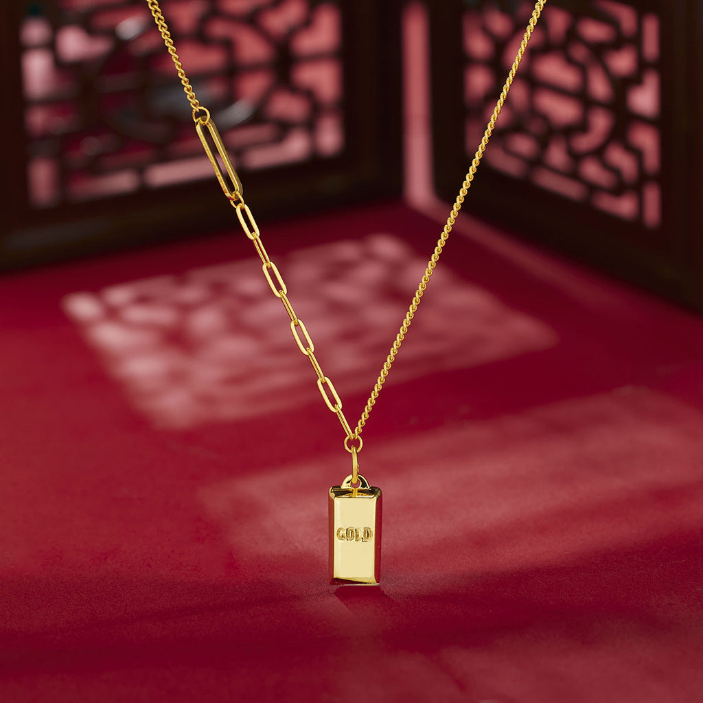Damen stilvolle Halskette mit goldfarbenem Anhänger im Barren-Design Shop Nory