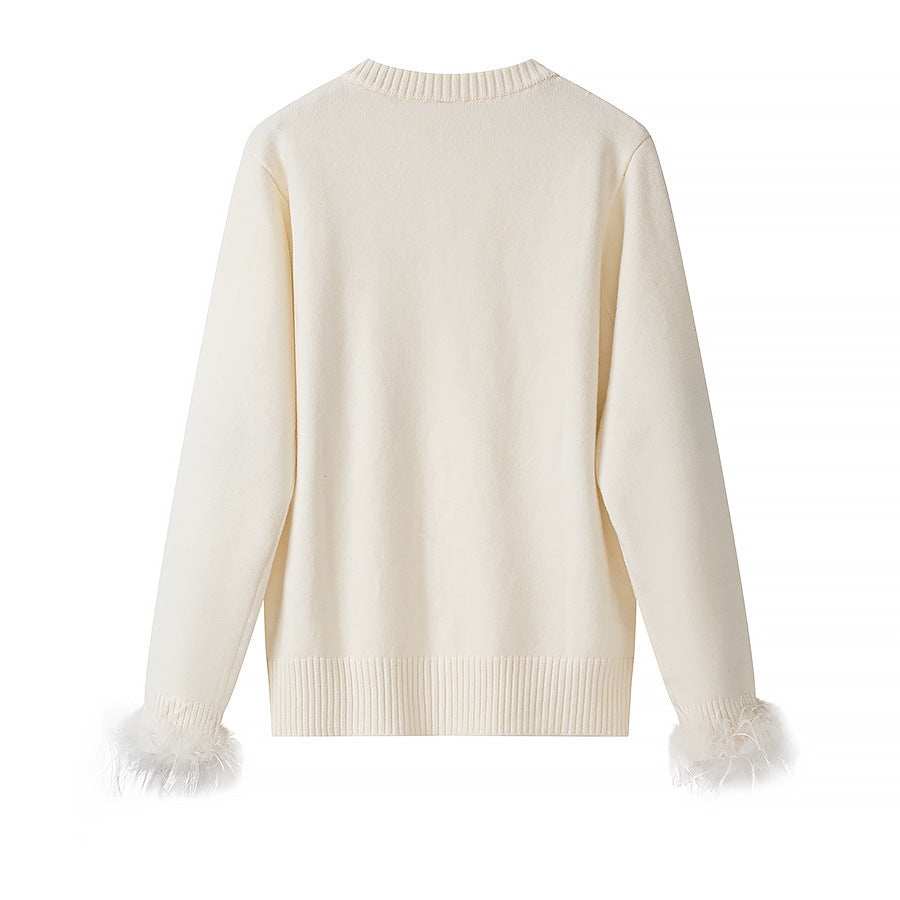 Damen Strickcardigan mit Perlenknöpfen und federbesetzten Ärmelbündchen Shop Nory