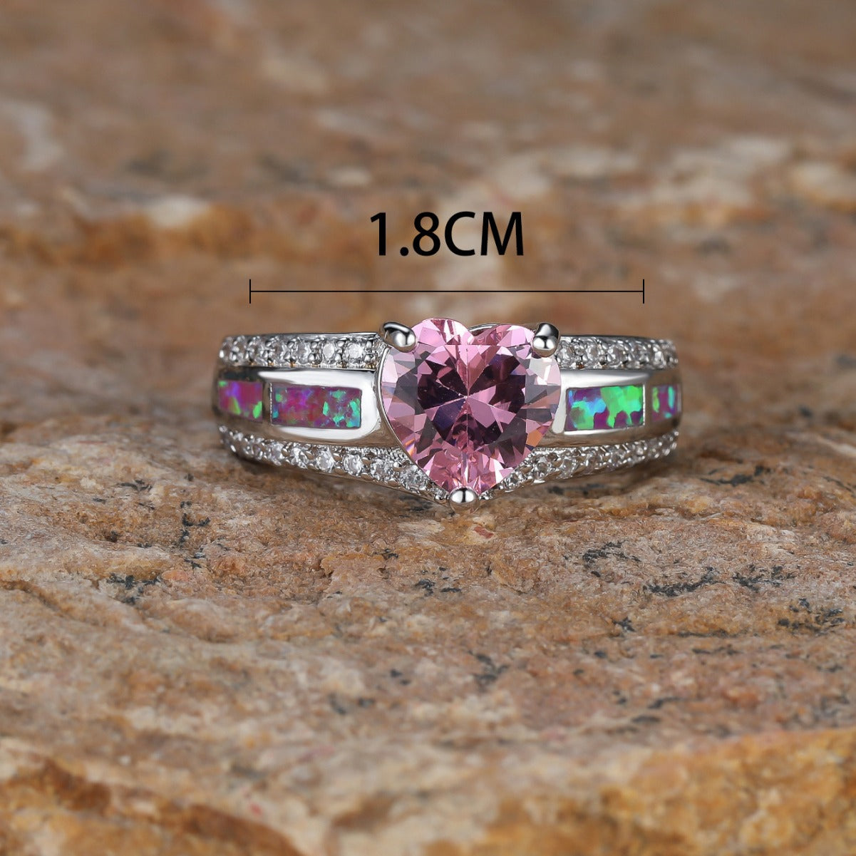 Damen Ring mit herzförmigem Pink-Glasstein und funkelnden Zirkonia-Details Shop Nory