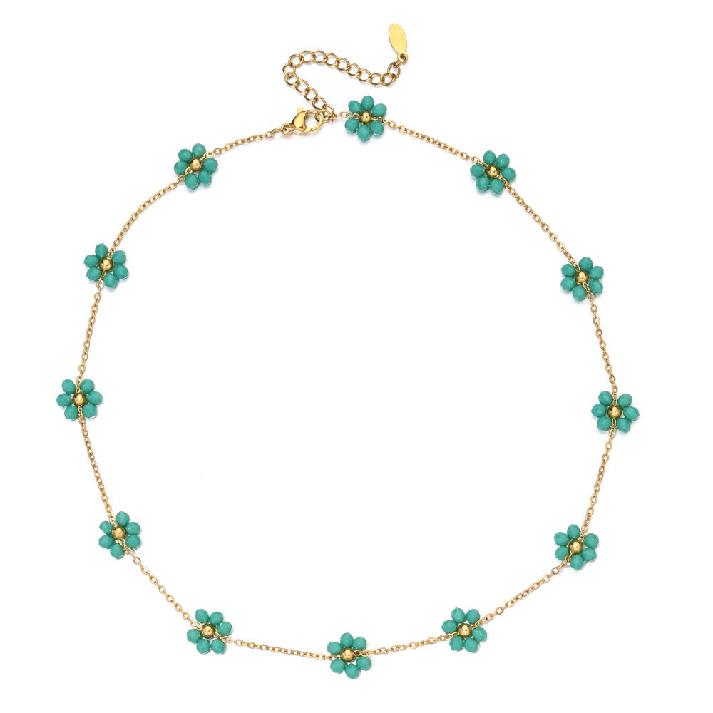 Damen zarte Halskette mit floralen Akzenten und goldfarbener Kettengestaltung Shop Nory