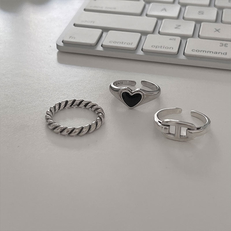 Damenring mit herzförmigem, schwarzem Stein und elegantem Silberdesign Shop Nory