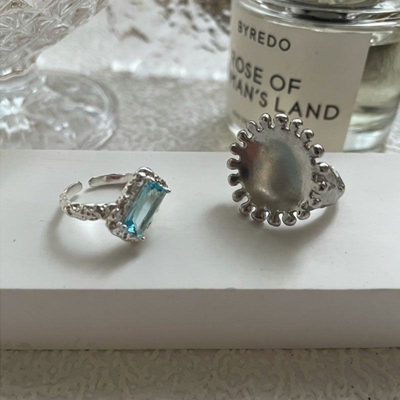 Damenring mit einzigartigem Design und facettiertem Edelstein Shop Nory