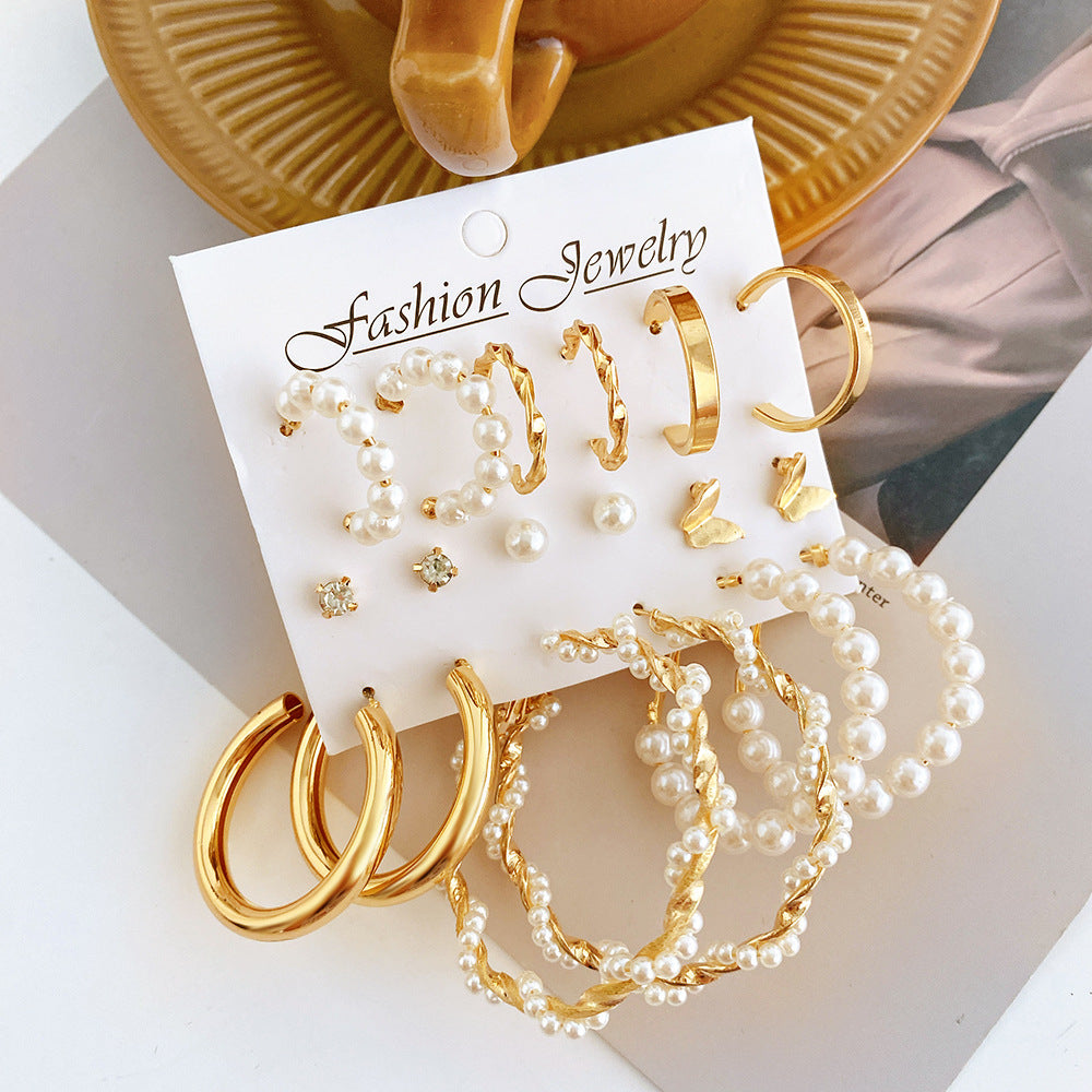 Damen Ohrringe Set mit elegantem Perlendesign und goldenen Akzenten Shop Nory