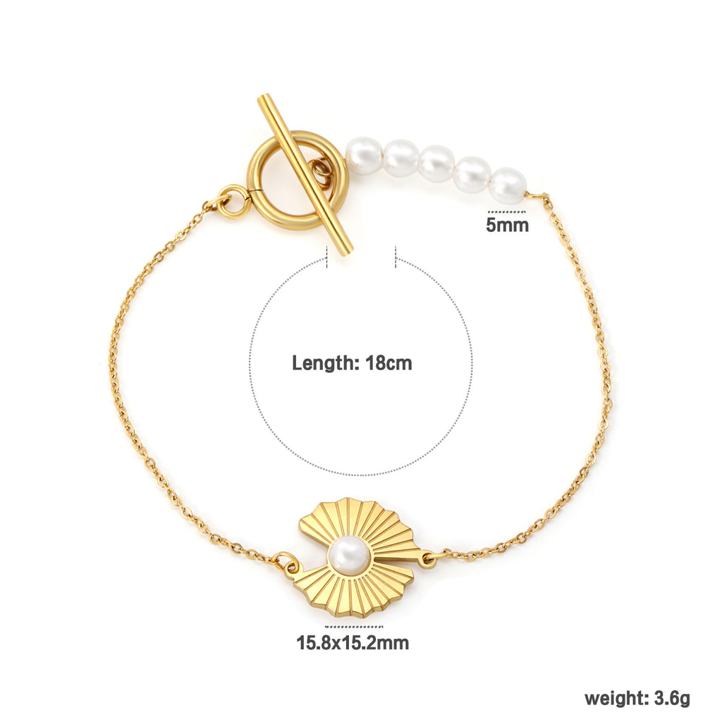 Damen Perlenarmband mit kunstvollem Muschel-Design und elegantem Toggleverschluss Shop Nory