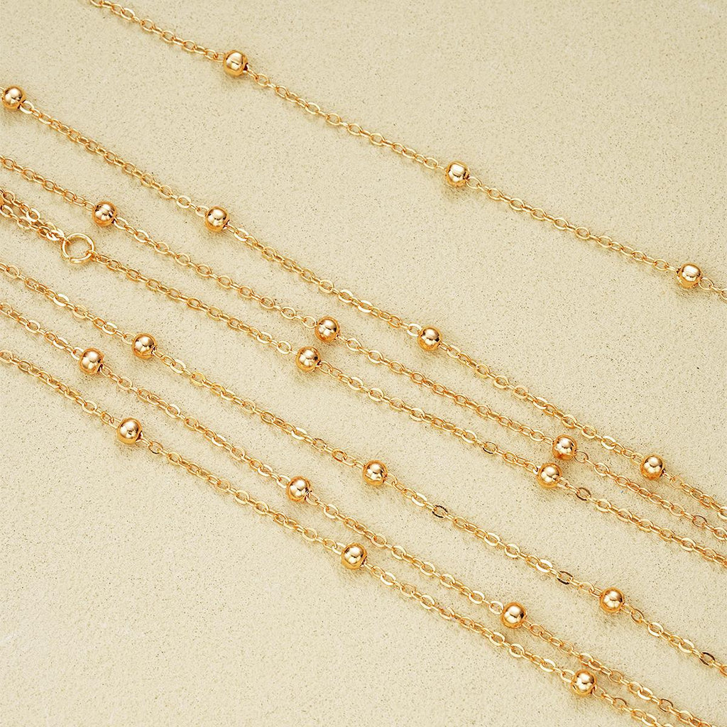 Damenkette mit zarten goldenen Akzenten und funkelnden Elementen Shop Nory