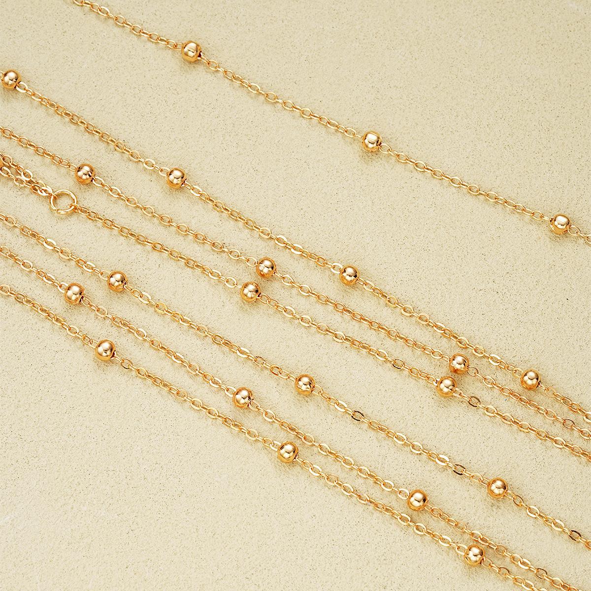 Damenkette mit zarten goldenen Akzenten und funkelnden Elementen Shop Nory