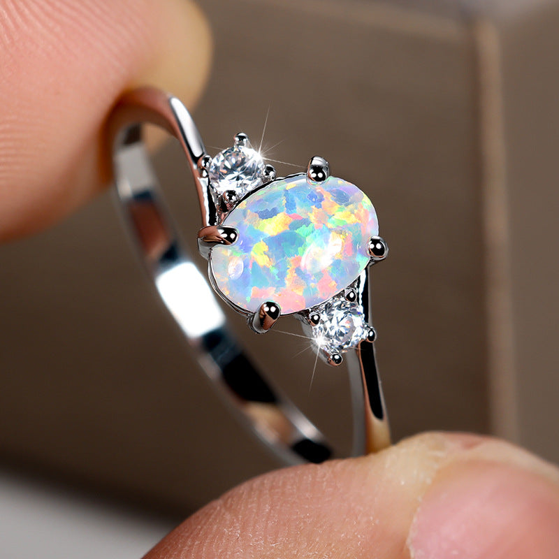 Damen Ring mit Opalstein und funkelnden Zirkonia Shop Nory