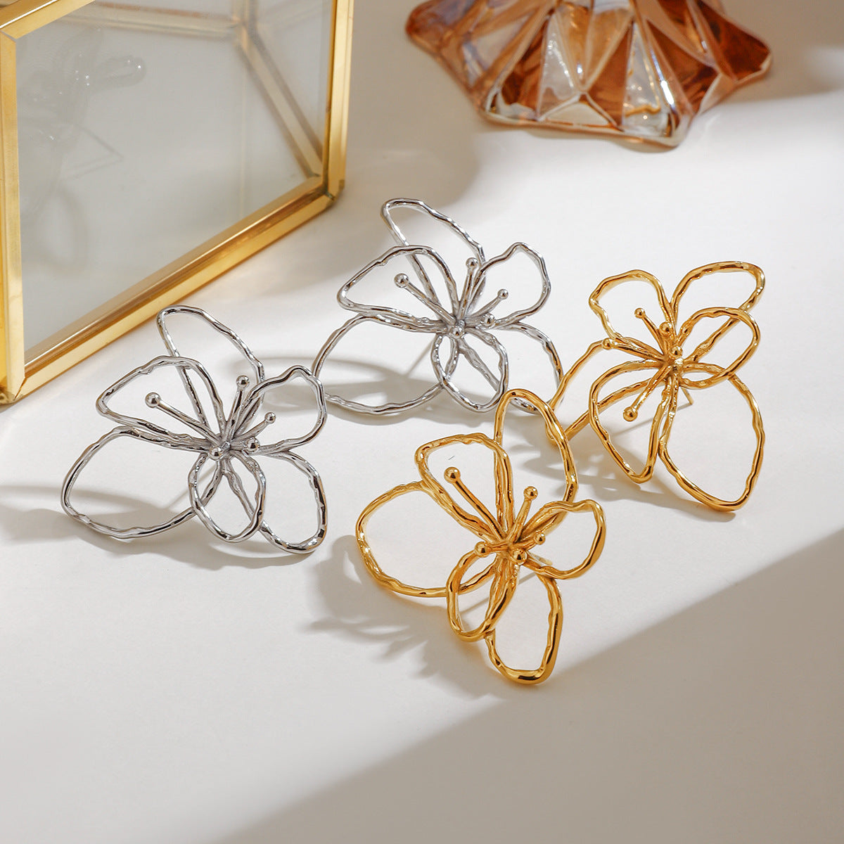 Damen Edelstahl Ohrstecker in floraler Gestaltung Shop Nory