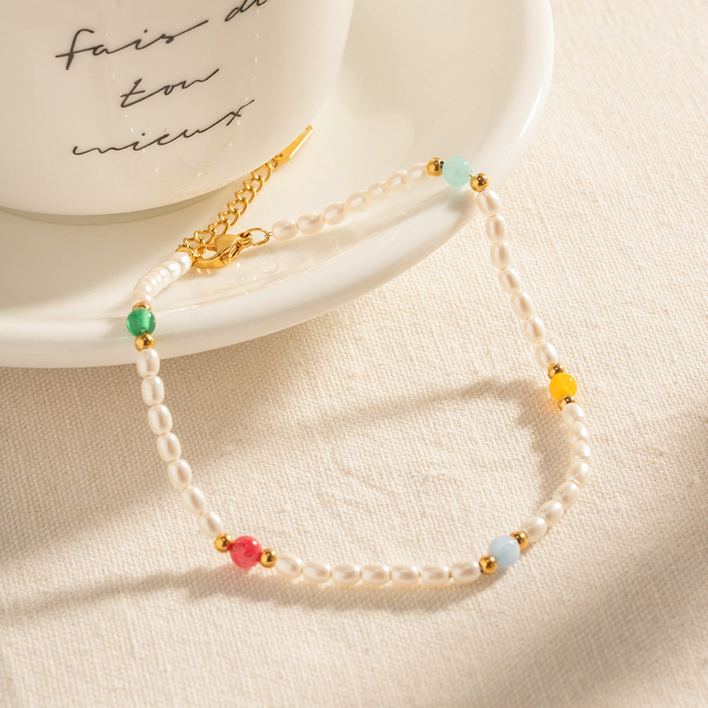 Damen Armband mit eleganten Perlen und bunten Steinakzenten Shop Nory