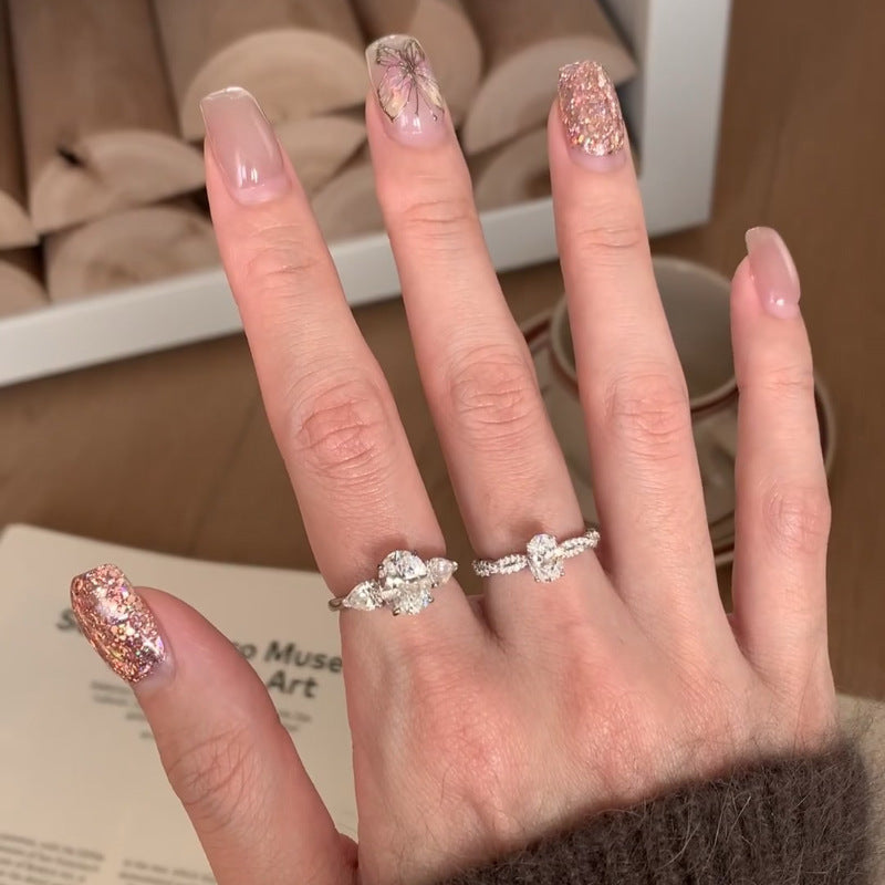 Damen Zarter und romantischer Ring mit funkelnden Zirkonia-Elementen Shop Nory
