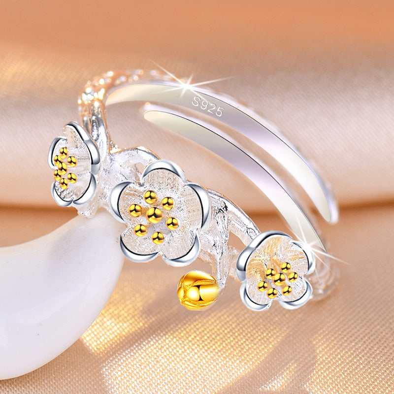 Damenring mit kunstvollem Blumenmuster und elegantem Zirkonia-Besatz Shop Nory