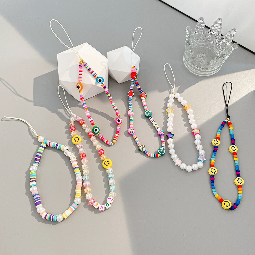 Damen farbenfrohe Schmuck-Halskette mit Smiley und Buchstabenanhängern Shop Nory
