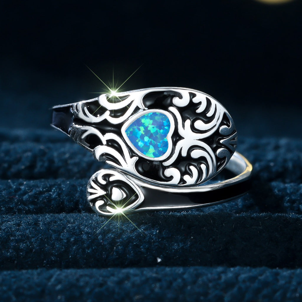 Damen Ring mit kunstvollem Design und schimmerndem Opal Shop Nory