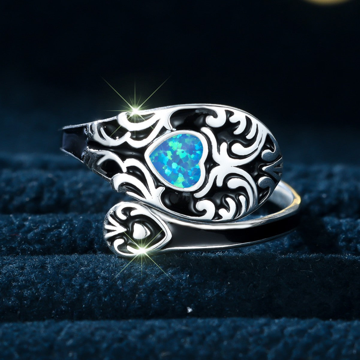 Damen Ring mit kunstvollem Design und schimmerndem Opal Shop Nory