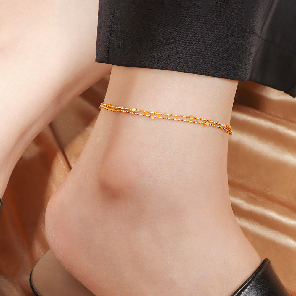 Damen Fußkette aus feinen Glieder und goldfarbenen Akzenten Shop Nory
