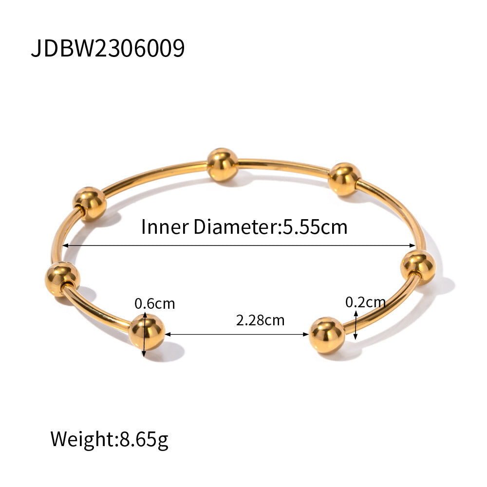 Damen Armreif mit elegantem Kugeldesign aus hypoallergenem Edelstahl Shop Nory