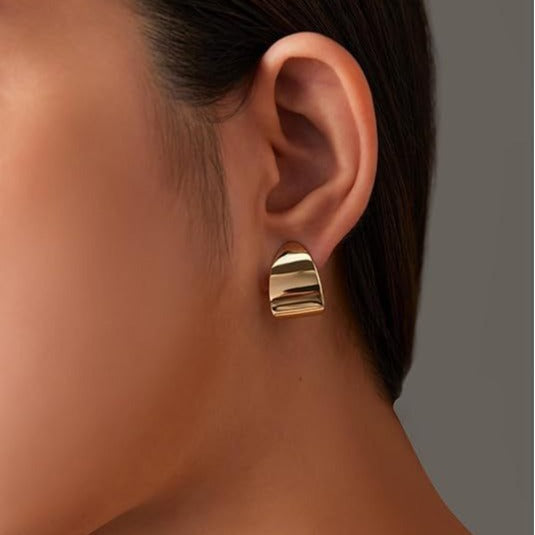 Damen Ohrringe mit skulpturalem Tropfen-Design und elegantem Finish Shop Nory