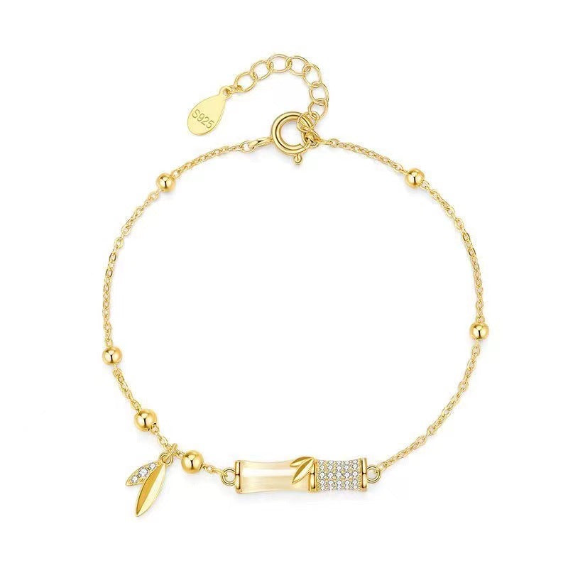 Damen filigranes Armband mit charmanten Anhängern Shop Nory