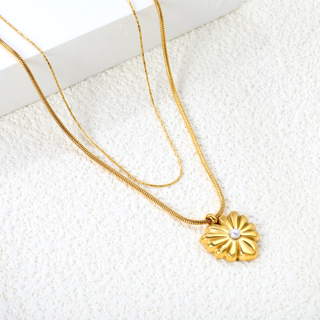 Damen Halskette mit funkelndem Herzanhänger aus goldplattiertem Edelstahl Shop Nory