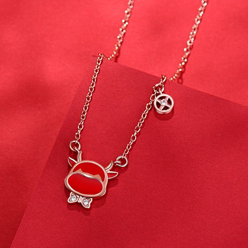 Damen Halskette mit charmantem Rinder-Motiv und funkelnden Zirkonia-Elementen Shop Nory