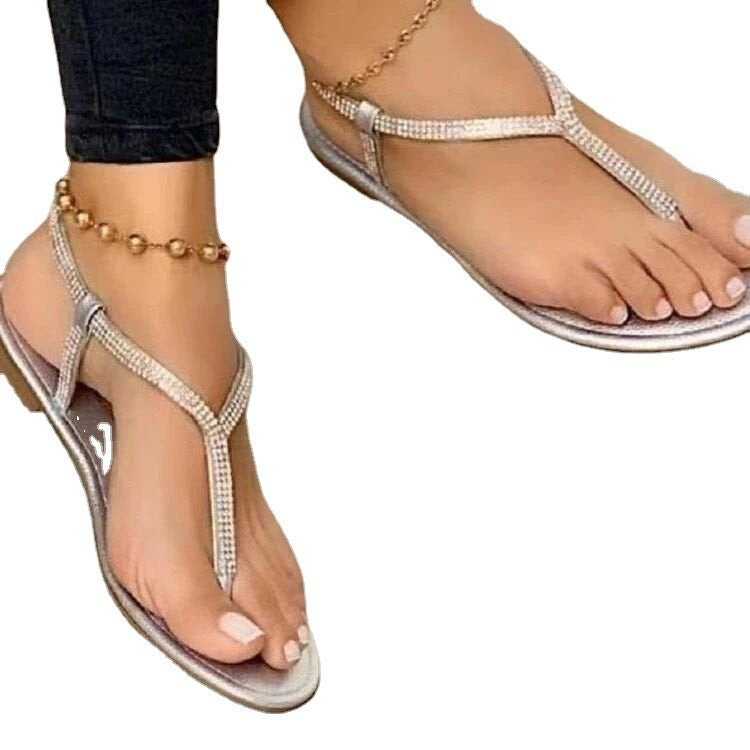 Damen Flache Zehentrenner‑Sandalen mit T‑Riemen und Strassbesatz Shop Nory