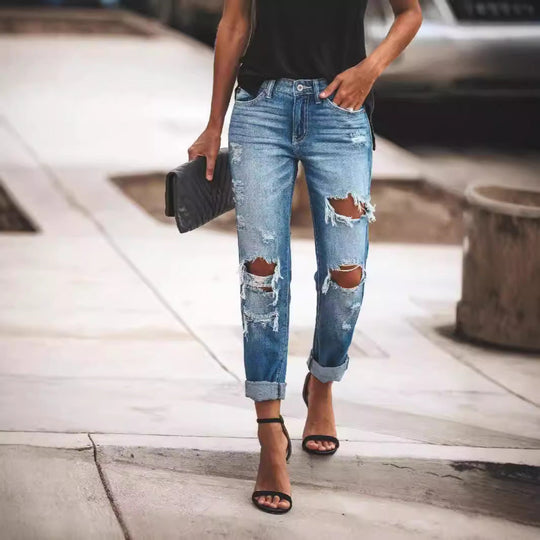 Damen Ripped Boyfriend Jeans mit lässigem Schnitt und fransigen Elementen