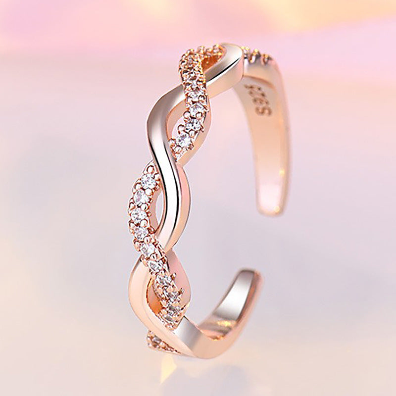 Damen Offenes Zirkonia Armband mit kunstvollem Zopfdesign Shop Nory