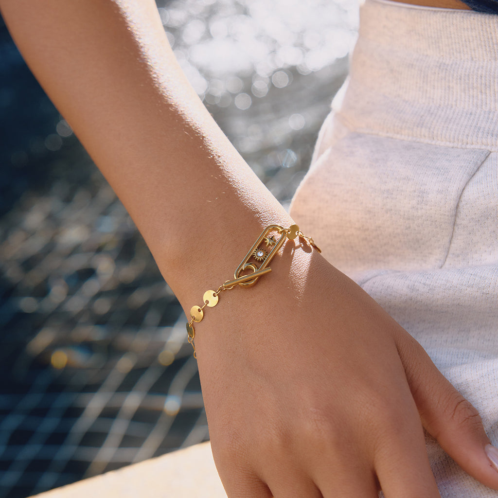 Damen Armband mit eleganten runden Anhängern aus hypoallergenem Edelstahl Shop Nory