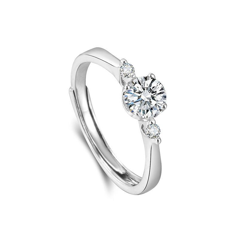Damen eleganter Ring mit funkelndem Solitär und verspieltem Zirkonia-Besatz Shop Nory