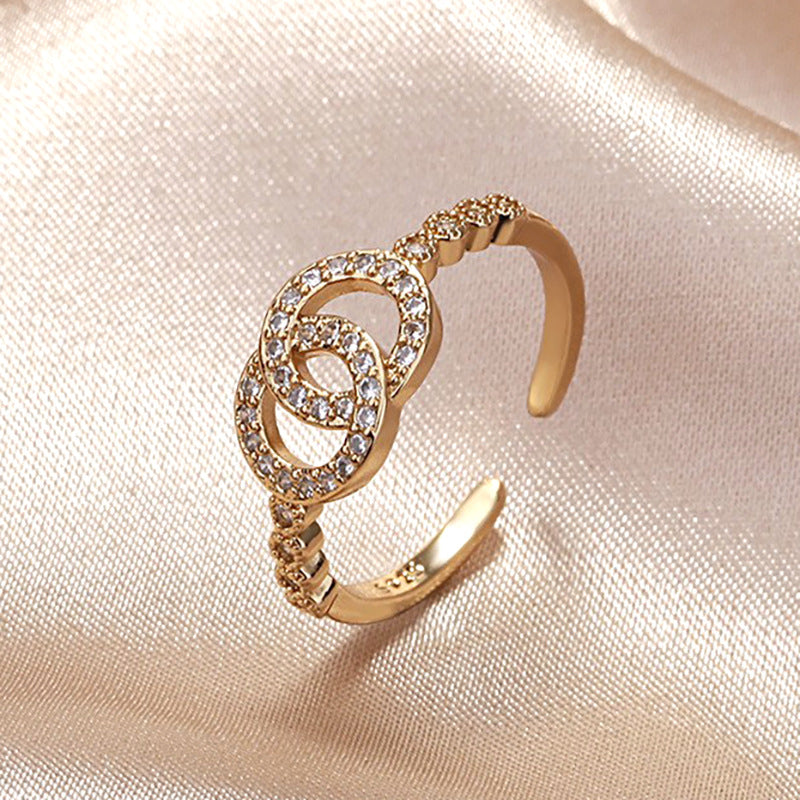 Damen Offener Ring mit funkelnden Zirkonia und elegantem Knoten-Design Shop Nory
