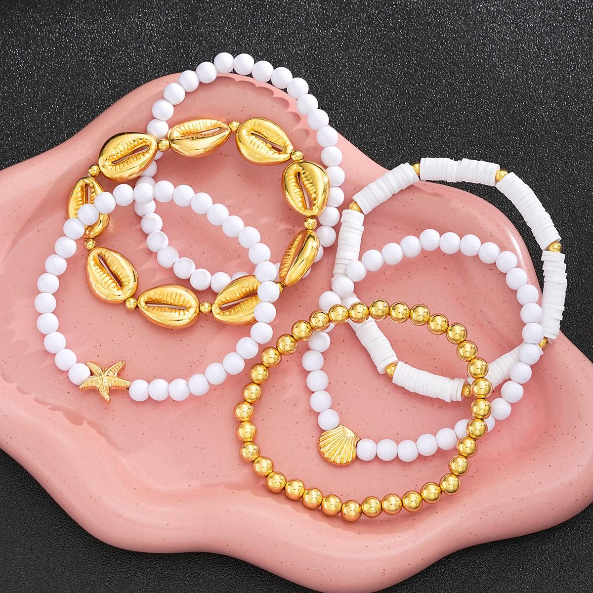 Damen Armreifen-Set mit maritimen Muschelmotiven Shop Nory