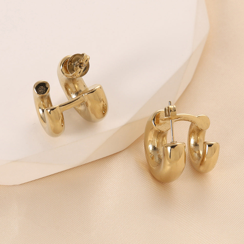 Damen Ohrstecker mit geschwungenem Design aus hochwertigem Edelstahl Shop Nory