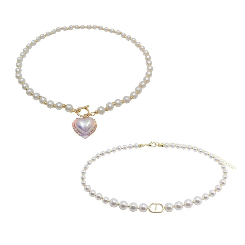 Damen elegante Perlenhalskette mit modischem Verschluss Shop Nory