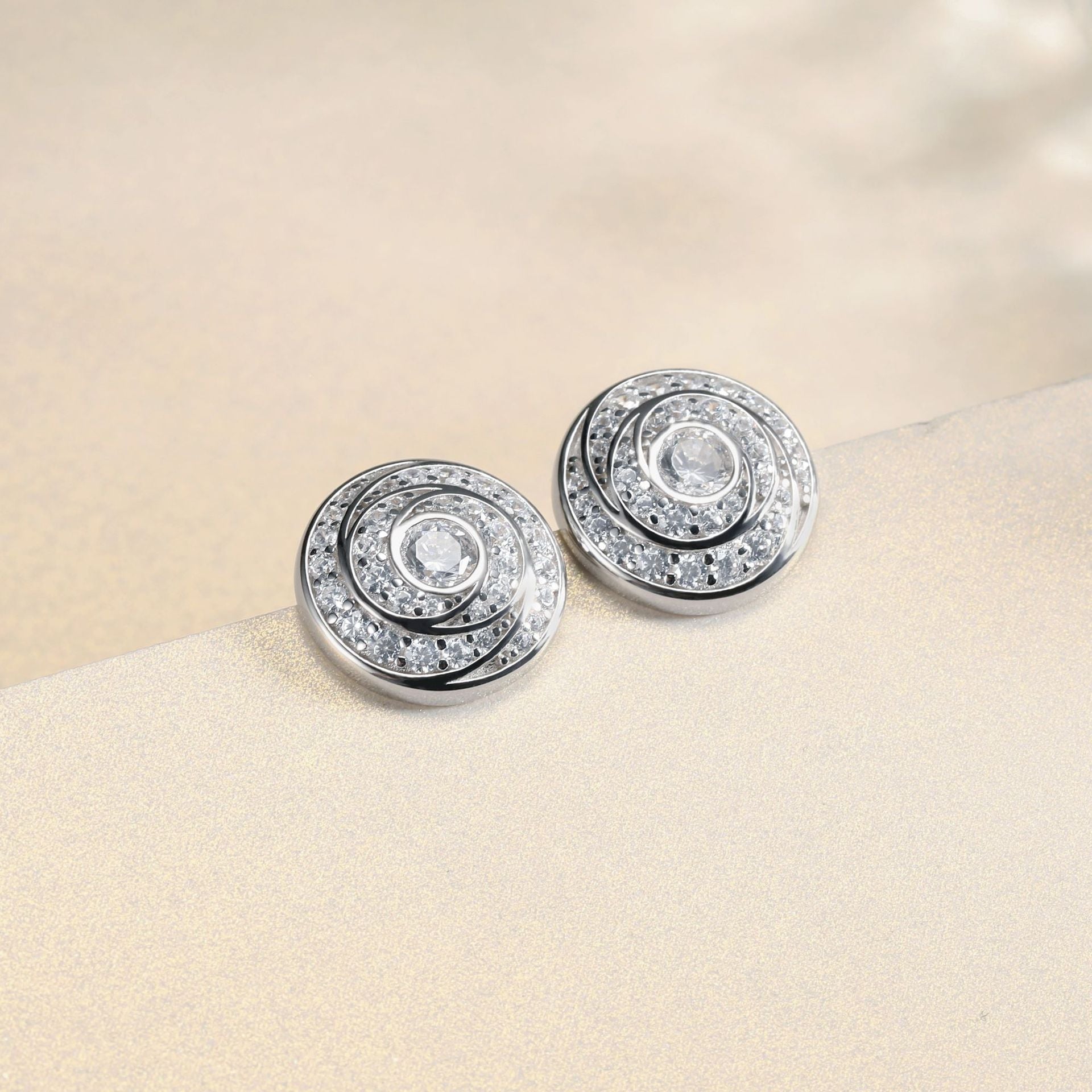 Damen-Ohrstecker mit spiralförmigem Zirkonia-Besatz Shop Nory