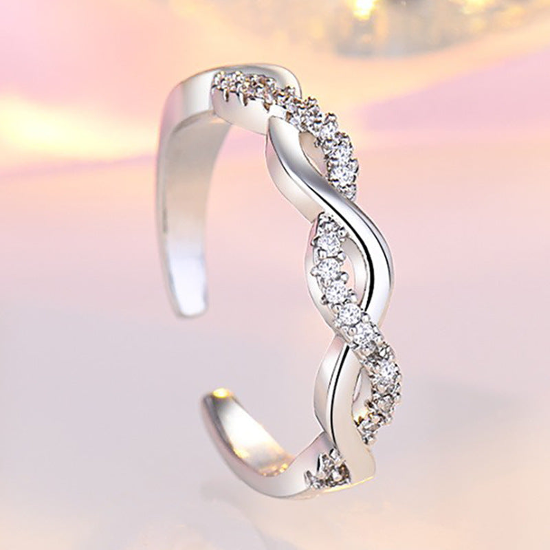 Damen Offenes Zirkonia Armband mit kunstvollem Zopfdesign Shop Nory