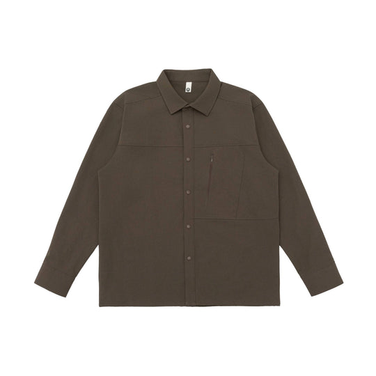 Unisex Oversize-Hemdjacke im Utility‑Style mit verdeckter Druckknopfleiste und diagonaler Reißverschlusstasche Shop Nory