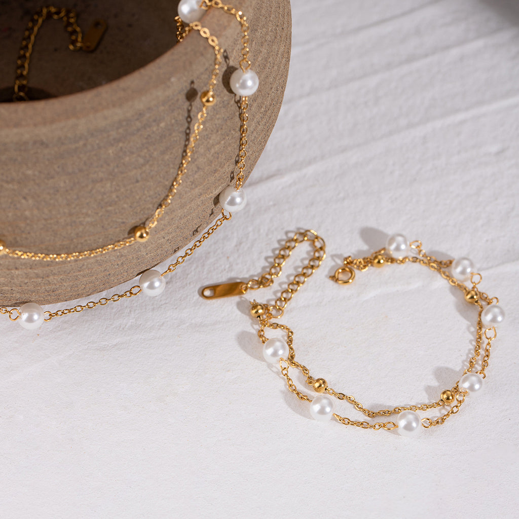 Damen Armband mit elegantem Perlen- und Goldakzent Design Shop Nory