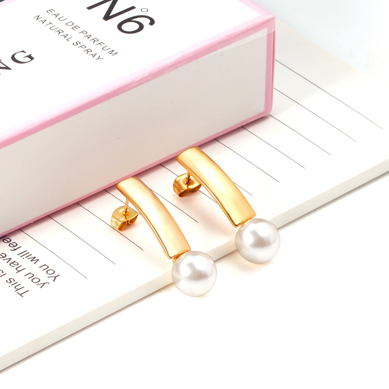 Damen Ohrhänger mit eleganter Goldbeschichtung und edler Perle Shop Nory